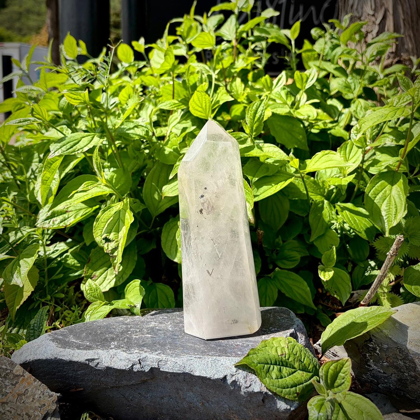 Clear quartz crystal prism home display piece with natural veiling, clarity and polished finish.