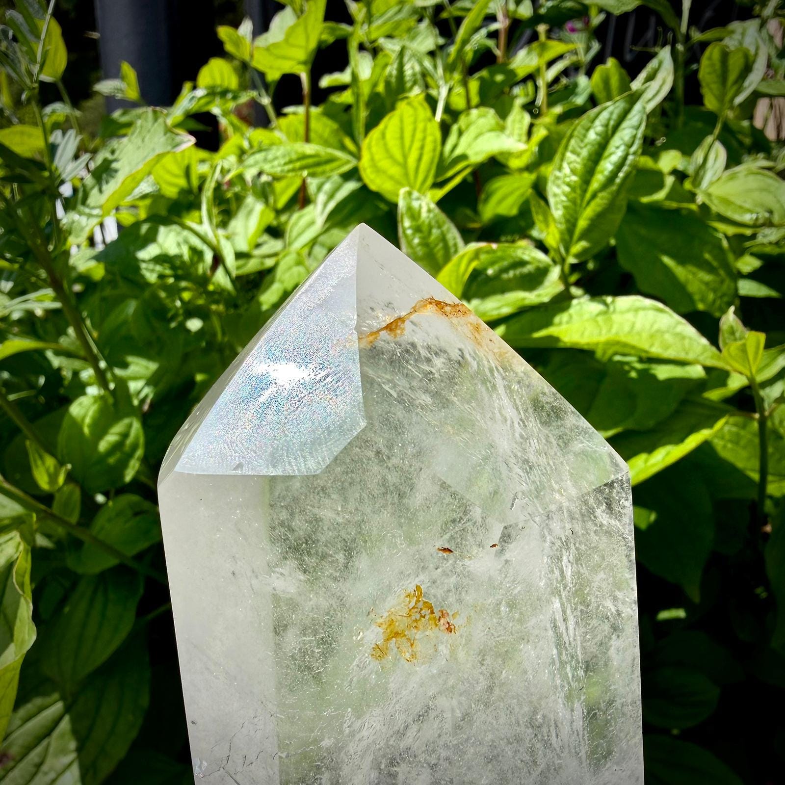 Clear quartz crystal prism from Madagascar with polished finish and natural detail.