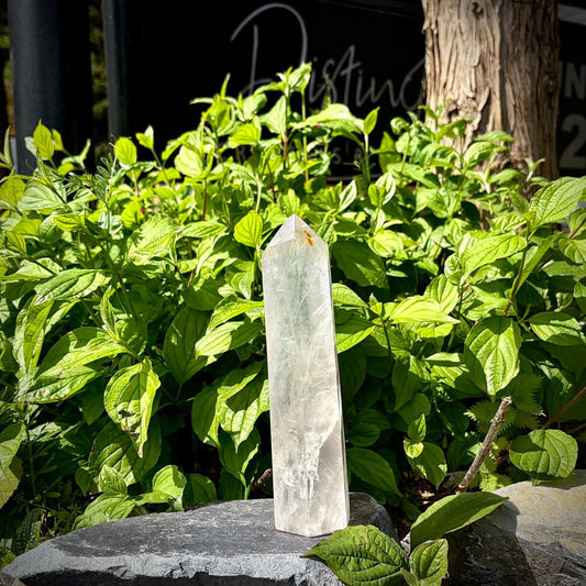 Clear quartz tower for interiors, combining natural mineral texture with a refined polished finish.