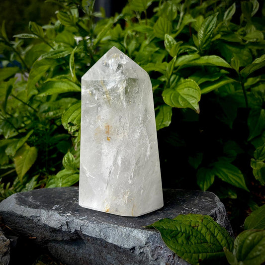 Clear quartz tower natural display piece with polished surfaces, rainbow detail and elegant home decor appeal.