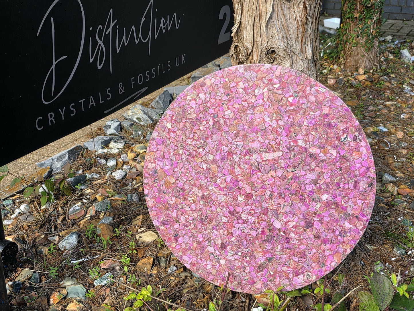 Luxury cobalt calcite inlay table top showcasing vivid pink crystal tones.