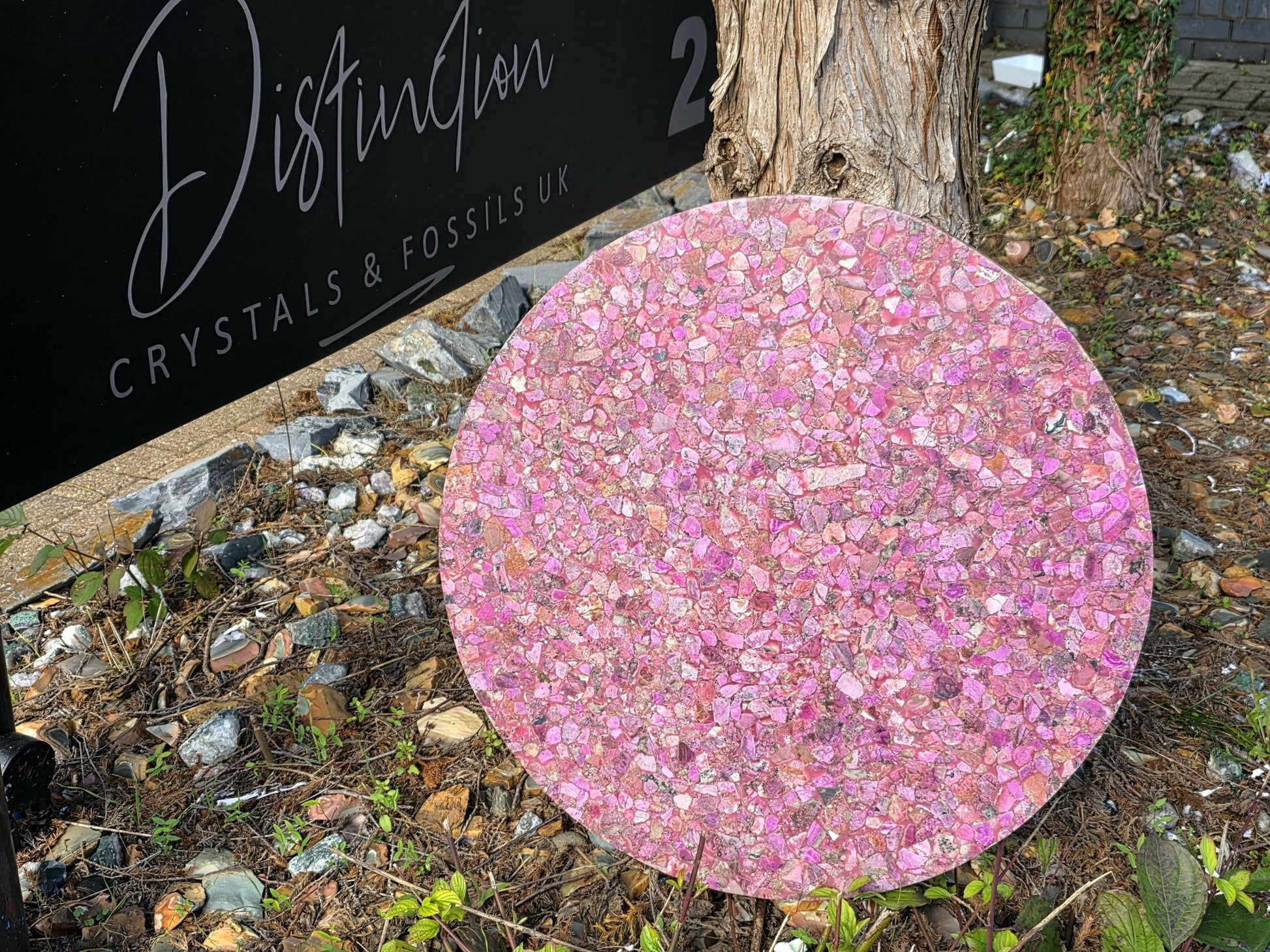 Luxury cobalt calcite inlay table top showcasing vivid pink crystal tones.