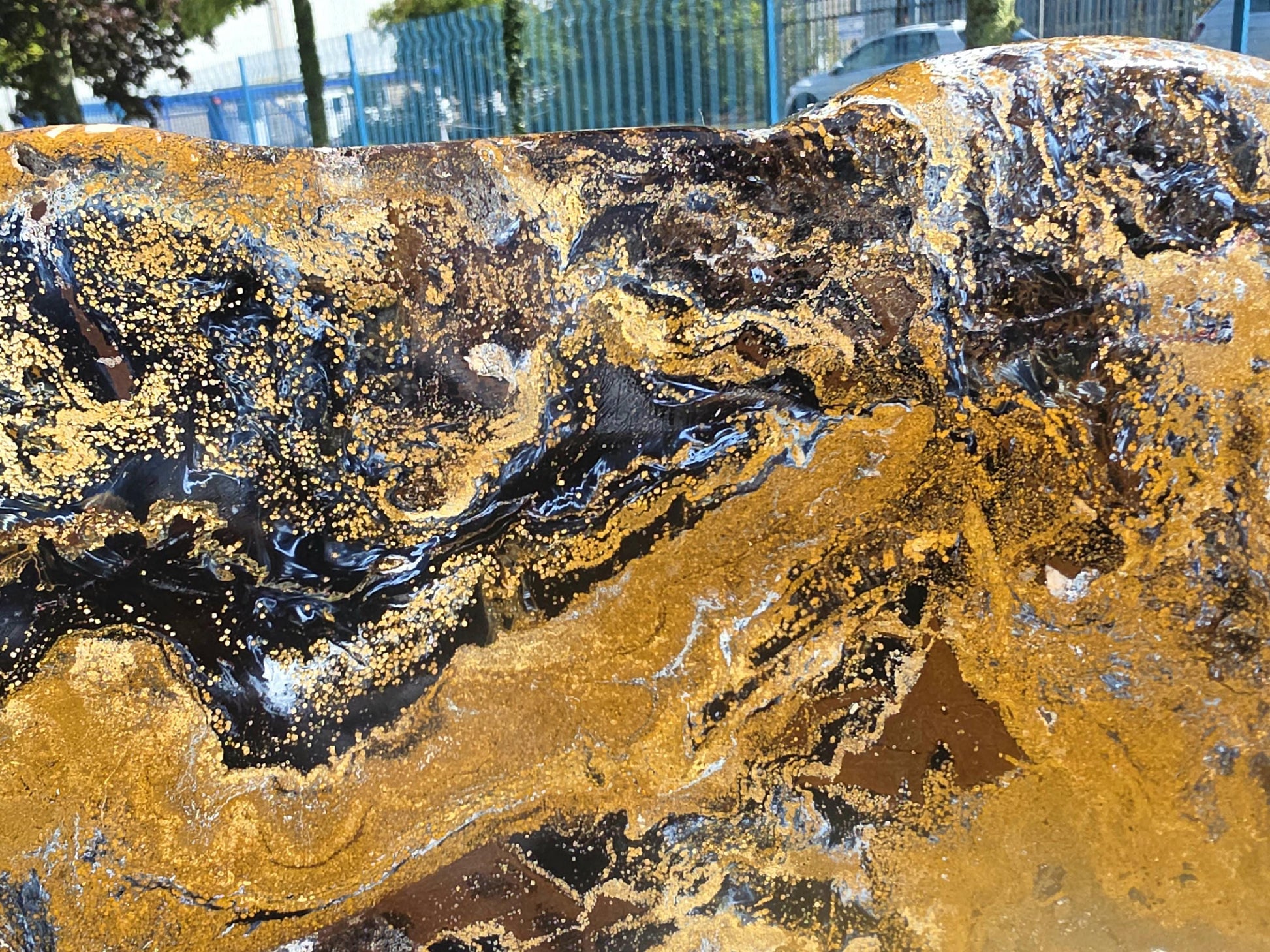 Collector-grade Pietersite pair with polished faces highlighting exceptional quality and rarity.