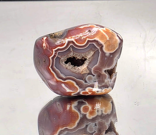 Collector Malawi Agate display polished geode.