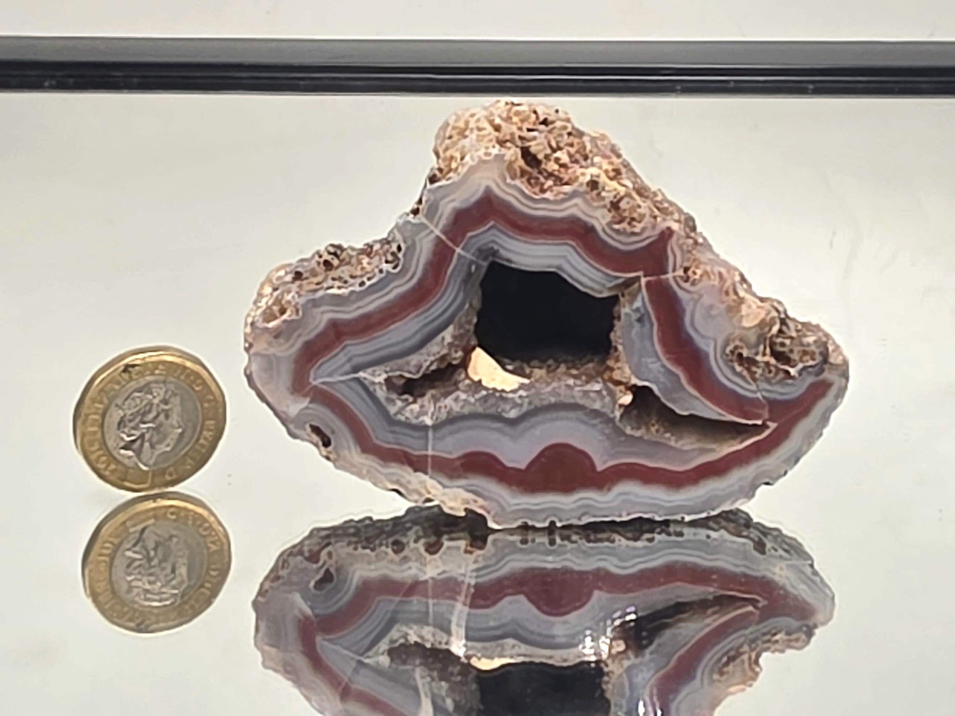 Collector rare Malawi Agate polished crystal geode.