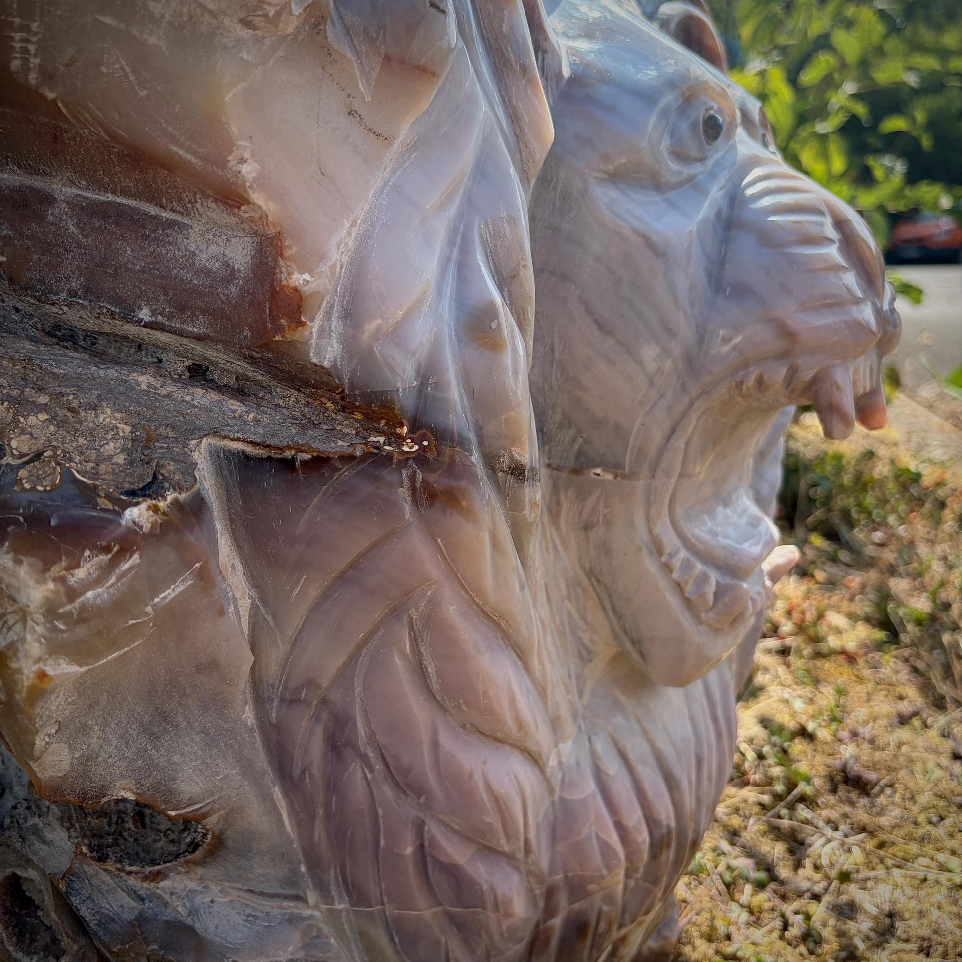 Collector-quality Madagascan Violet Agate lion sculpture with exceptional craftsmanship.
