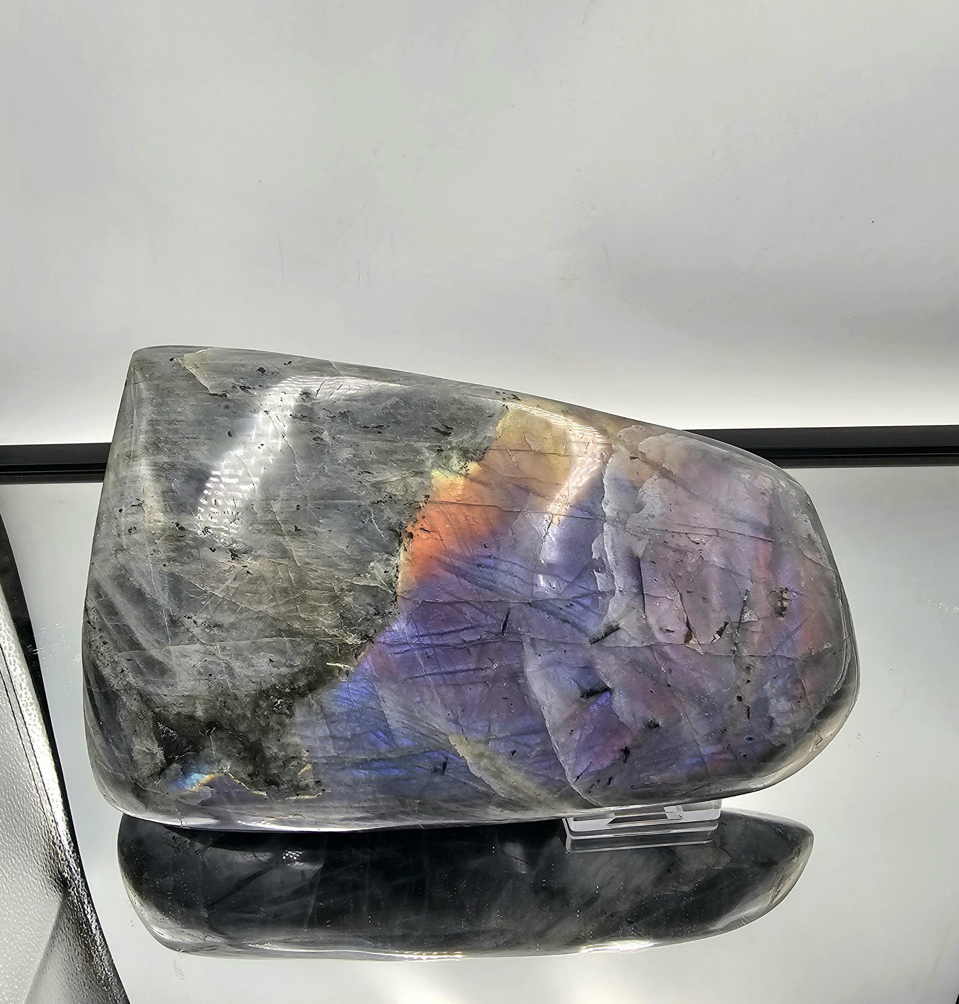 Labradorite crystal with full flash, perfect for collectors.