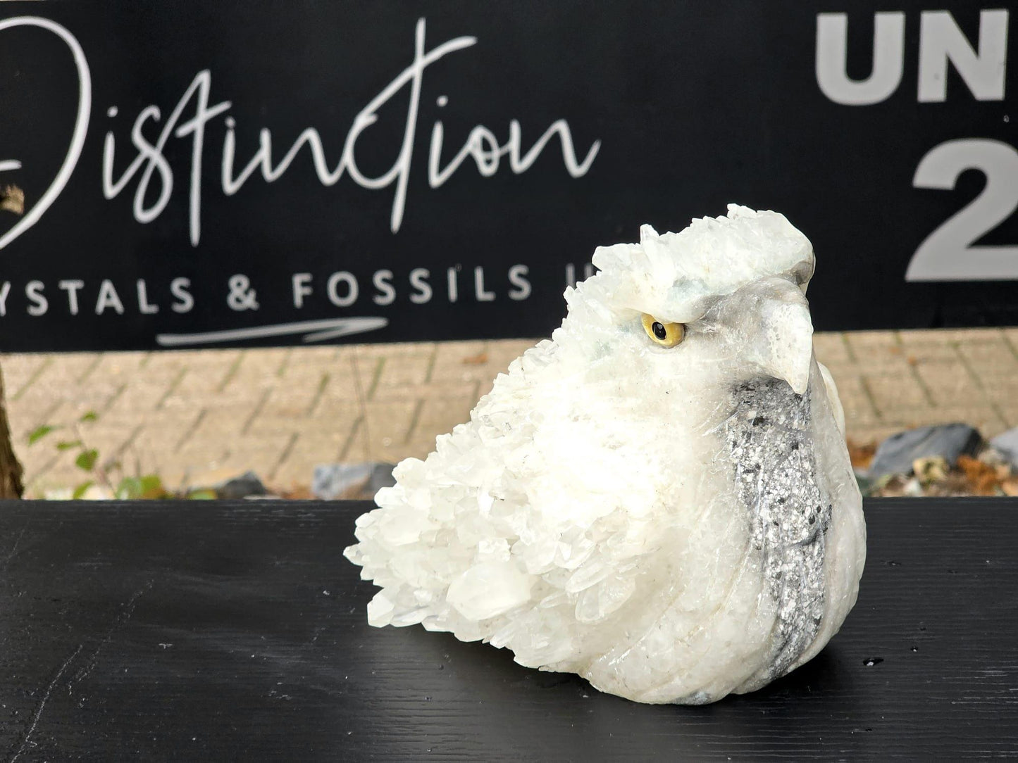 rystal eagle carving made from natural quartz gemstone.
