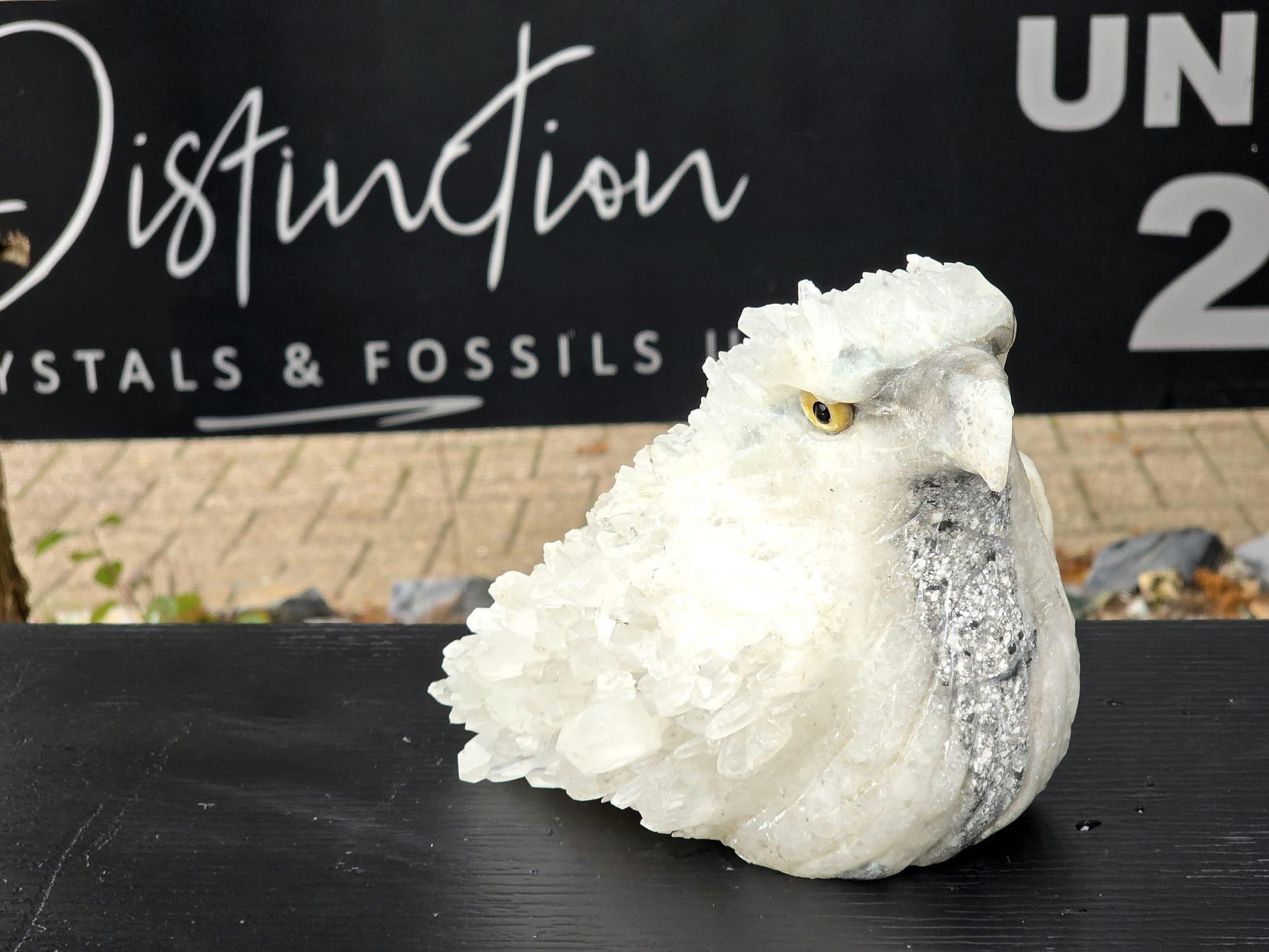rystal eagle carving made from natural quartz gemstone.