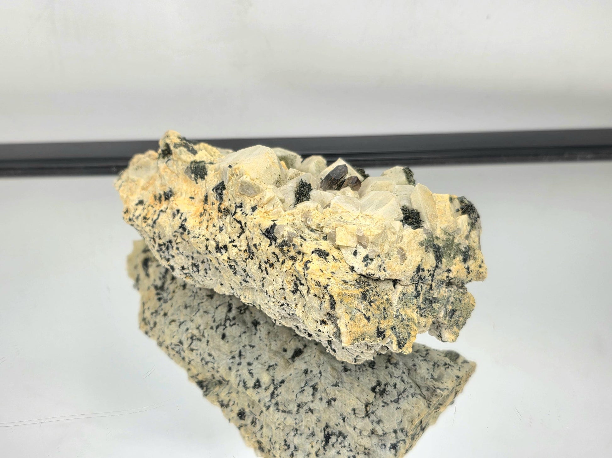 Rare mineral combination showcasing bold natural geometry.