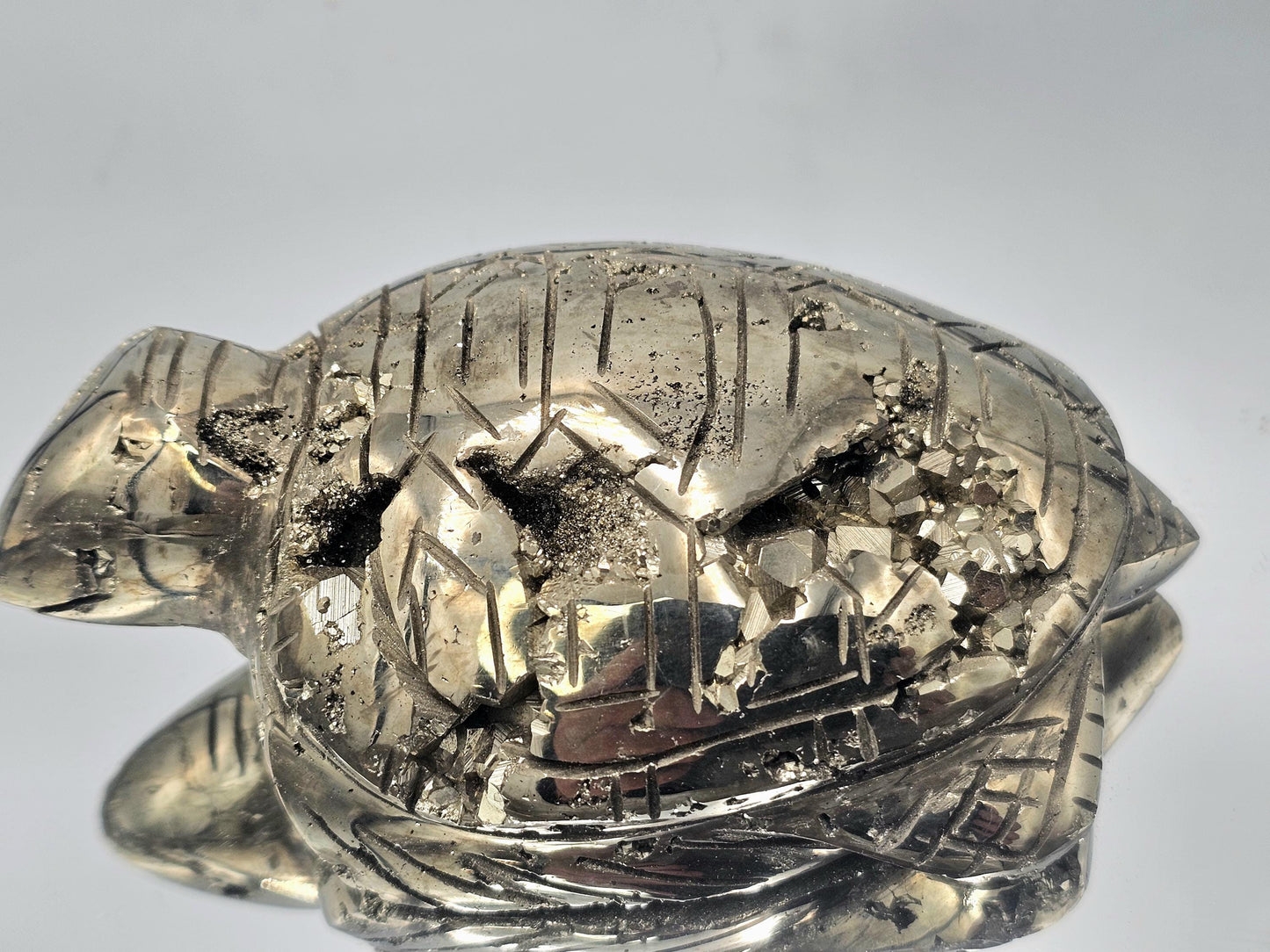 Luxury home decor featuring a Pyrite Turtle Carving from Peru.