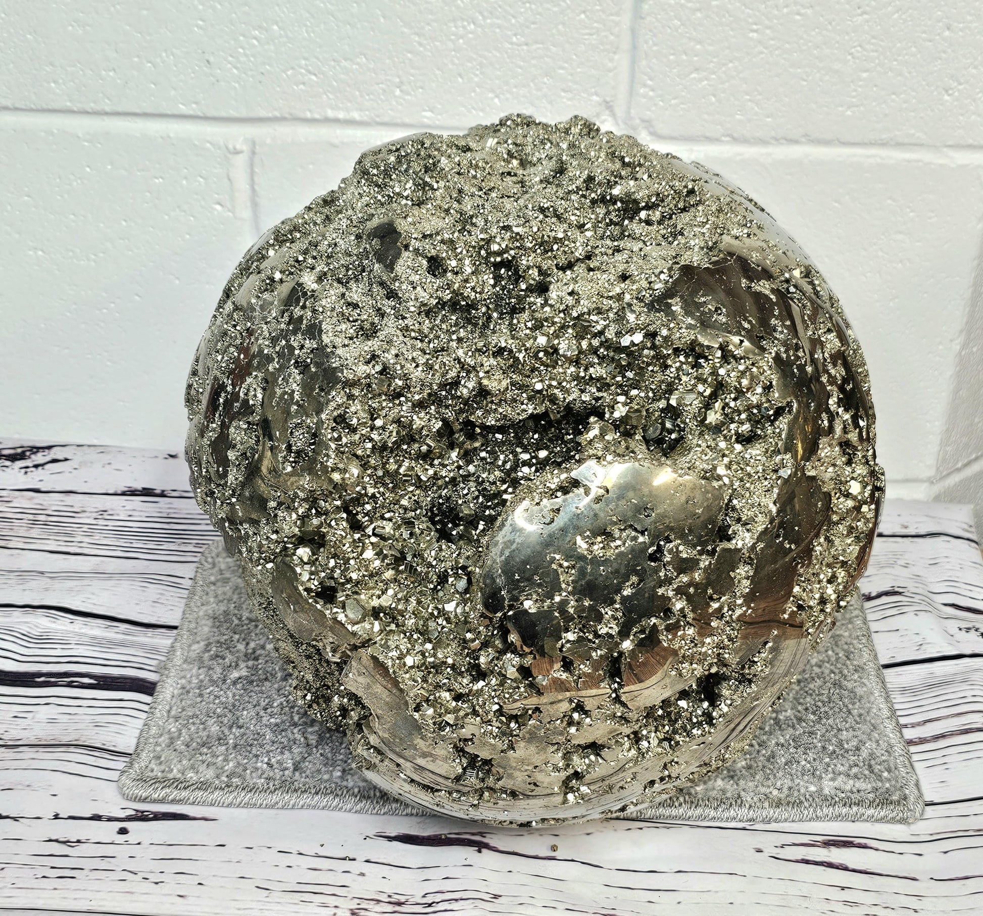 Decorative large pyrite sphere with exceptional metallic color.