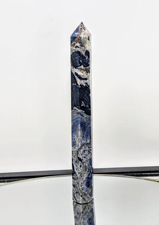 Deep blue Sodalite crystal tower, perfect for collectors.
