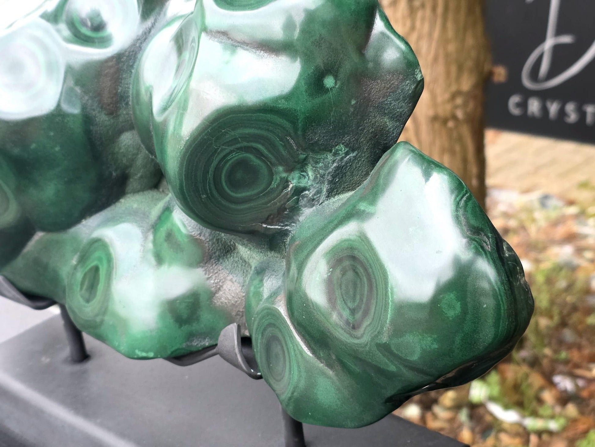 Designer Malachite mineral sculpture on stand for refined interiors