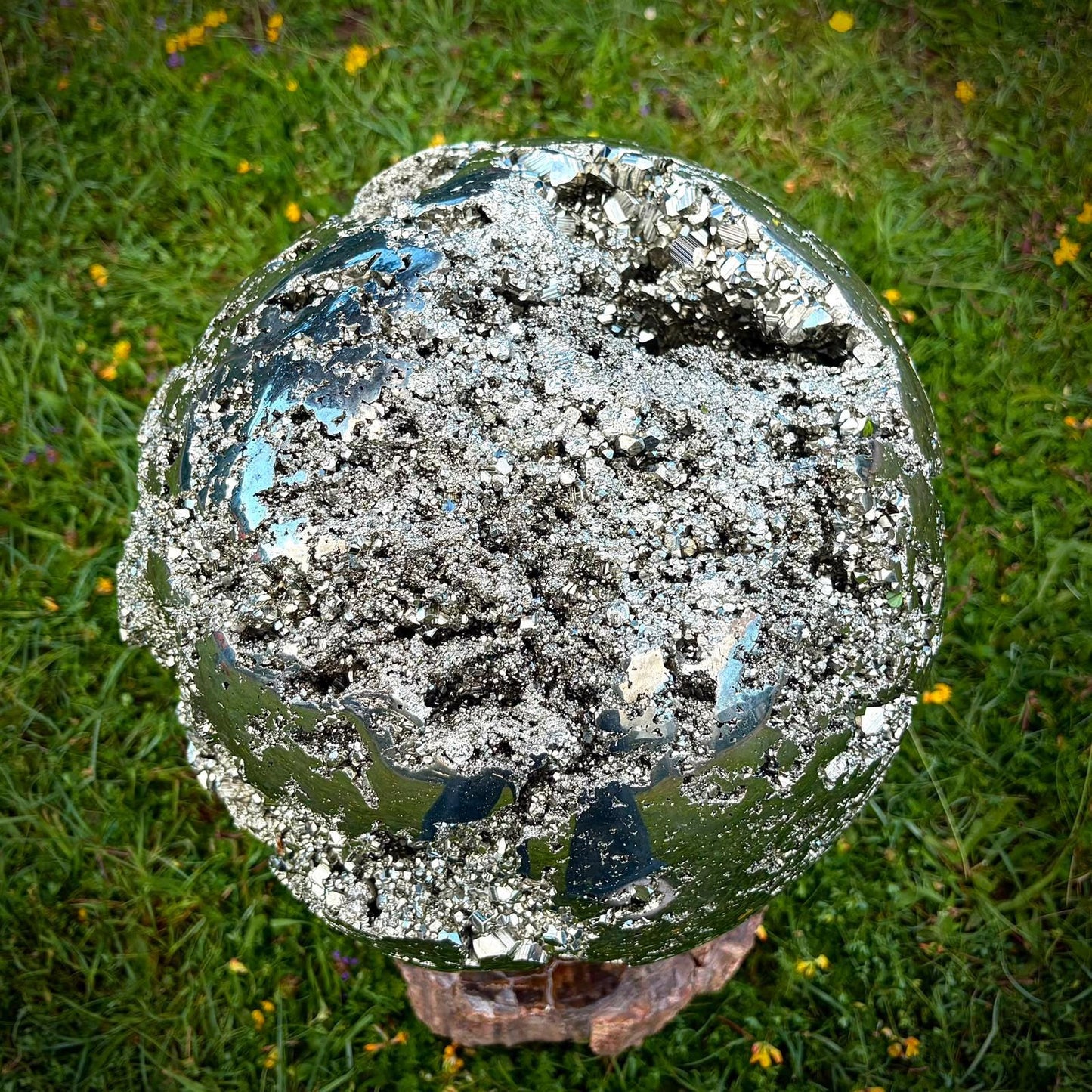 Large Peruvian Pyrite sphere styled as a designer centrepiece for a luxury interior.