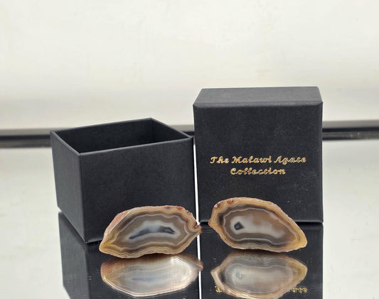 Malawi Agate crystal with bold banding, boxed for display or gifting.