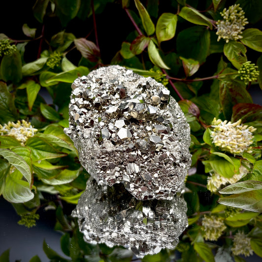 Front view of a large Pyrite cluster highlighting its bright metallic lustre and dimensions.