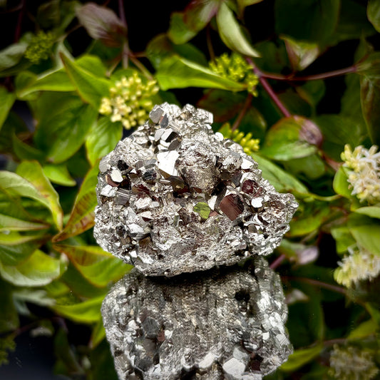 Front view of a large Pyrite cluster highlighting its bright metallic lustre and dimensions.