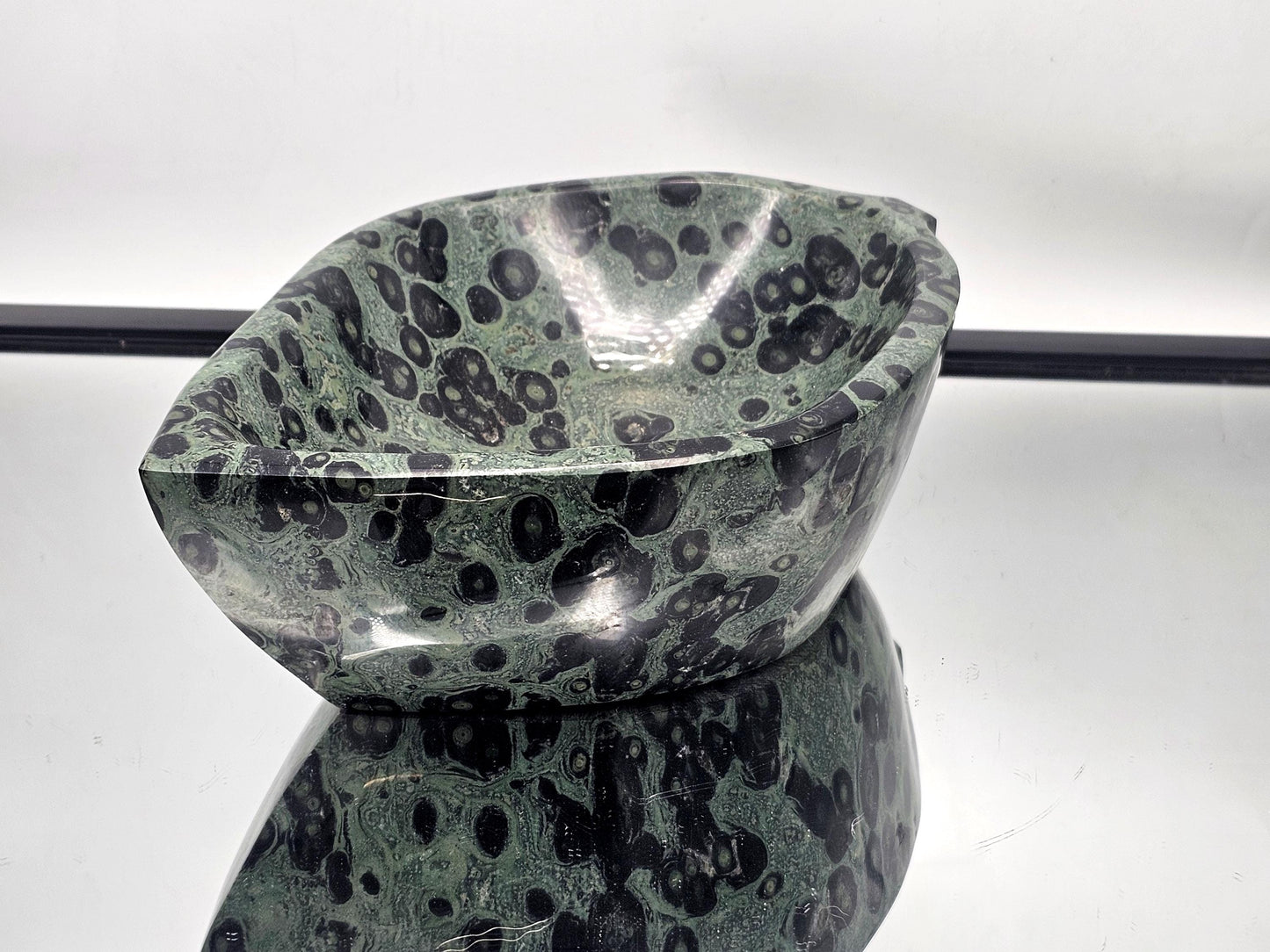 Earth-toned Kambaba Jasper crystal leaf bowl.