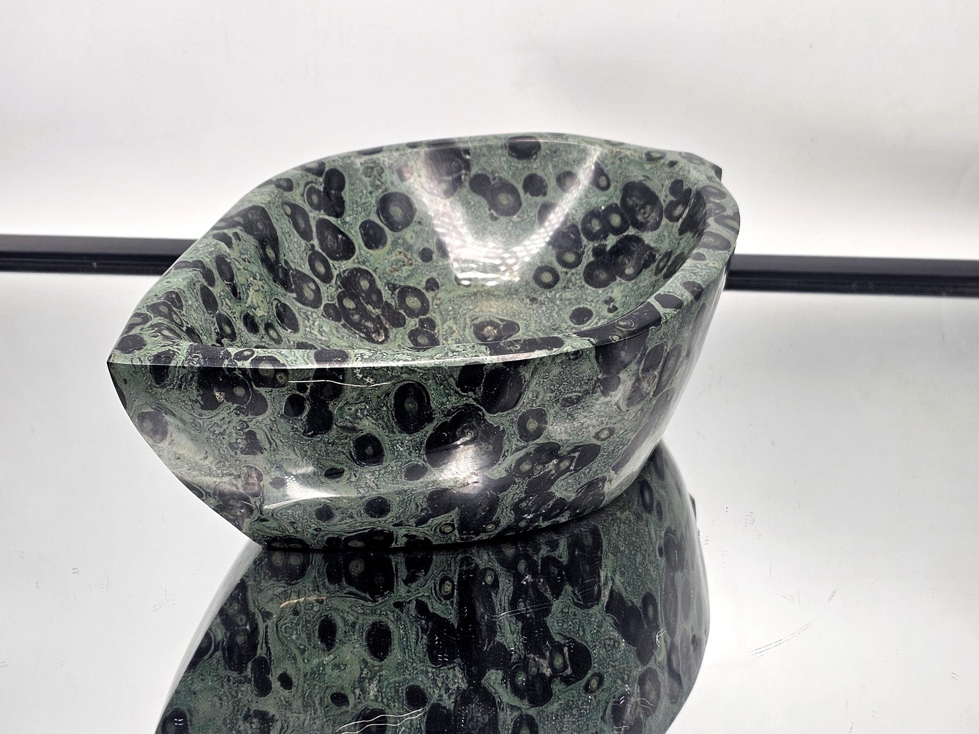 Earth-toned Kambaba Jasper crystal leaf bowl.