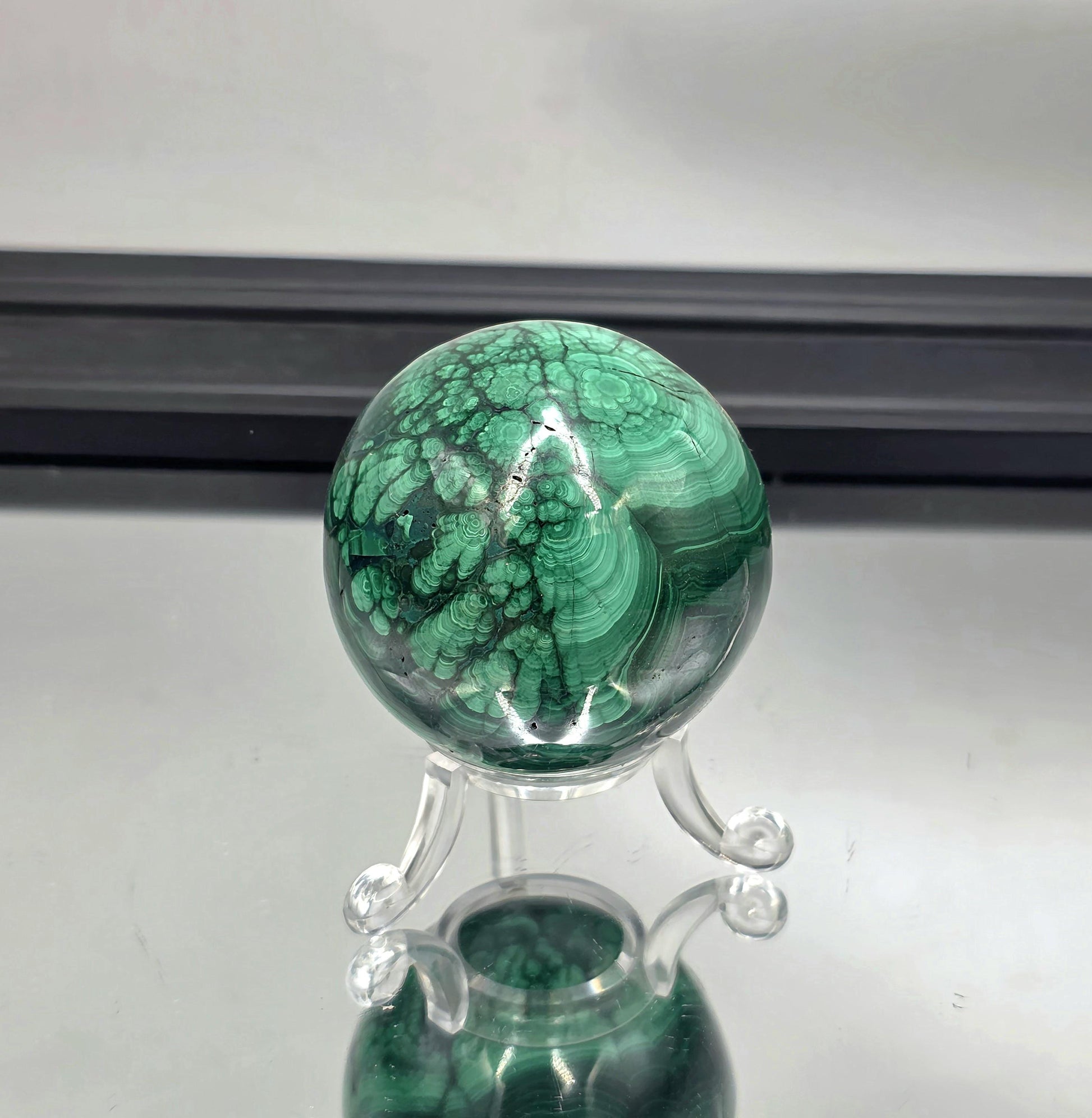 floral malachite sphere with flower patterns