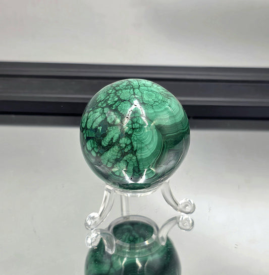 floral malachite sphere with flower patterns