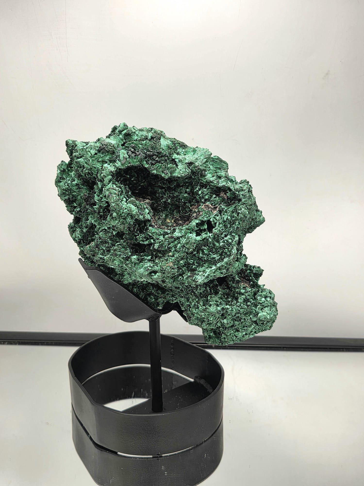 unique malachite crystal presented on custom made stand