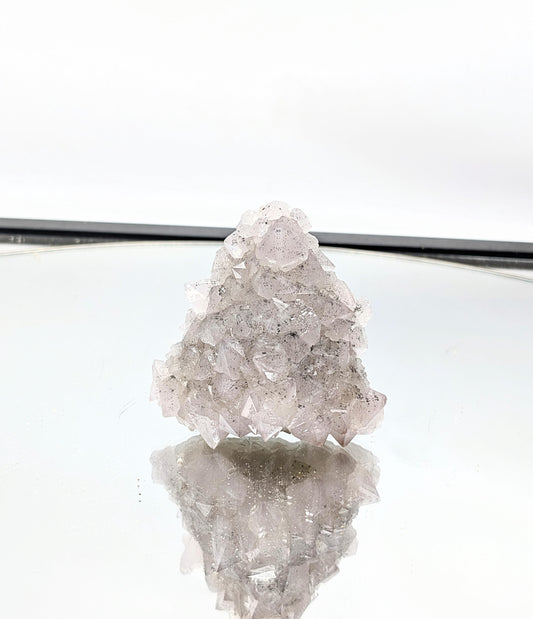 Fluorite cluster with Quartz inclusions.