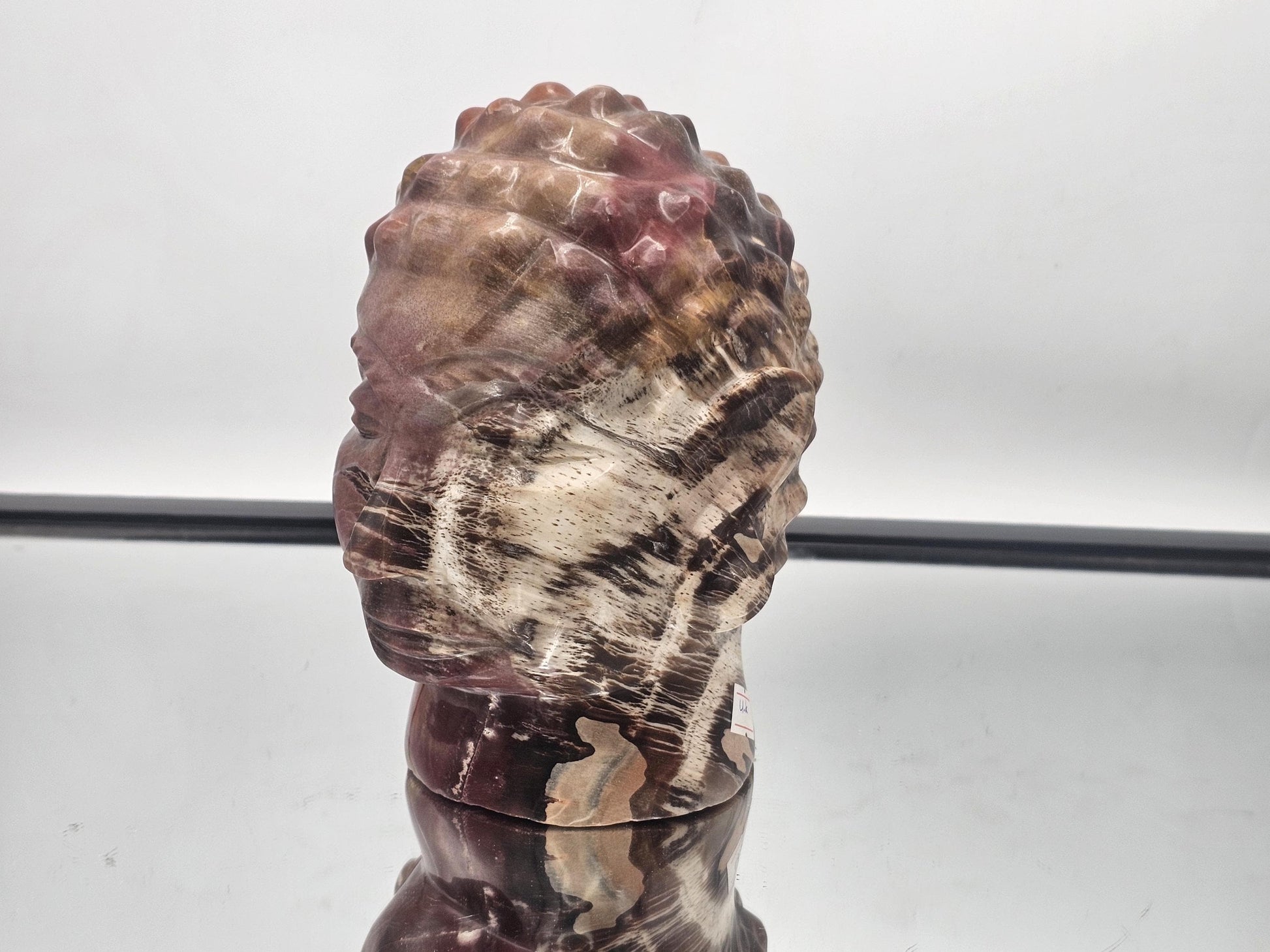 Stunning Fossil Wood Buddha statue featuring intricate hand-carved details and natural beauty.