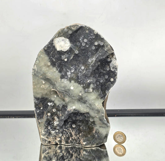 Freestanding apophyllite crystal on chalcedony base with natural sparkle