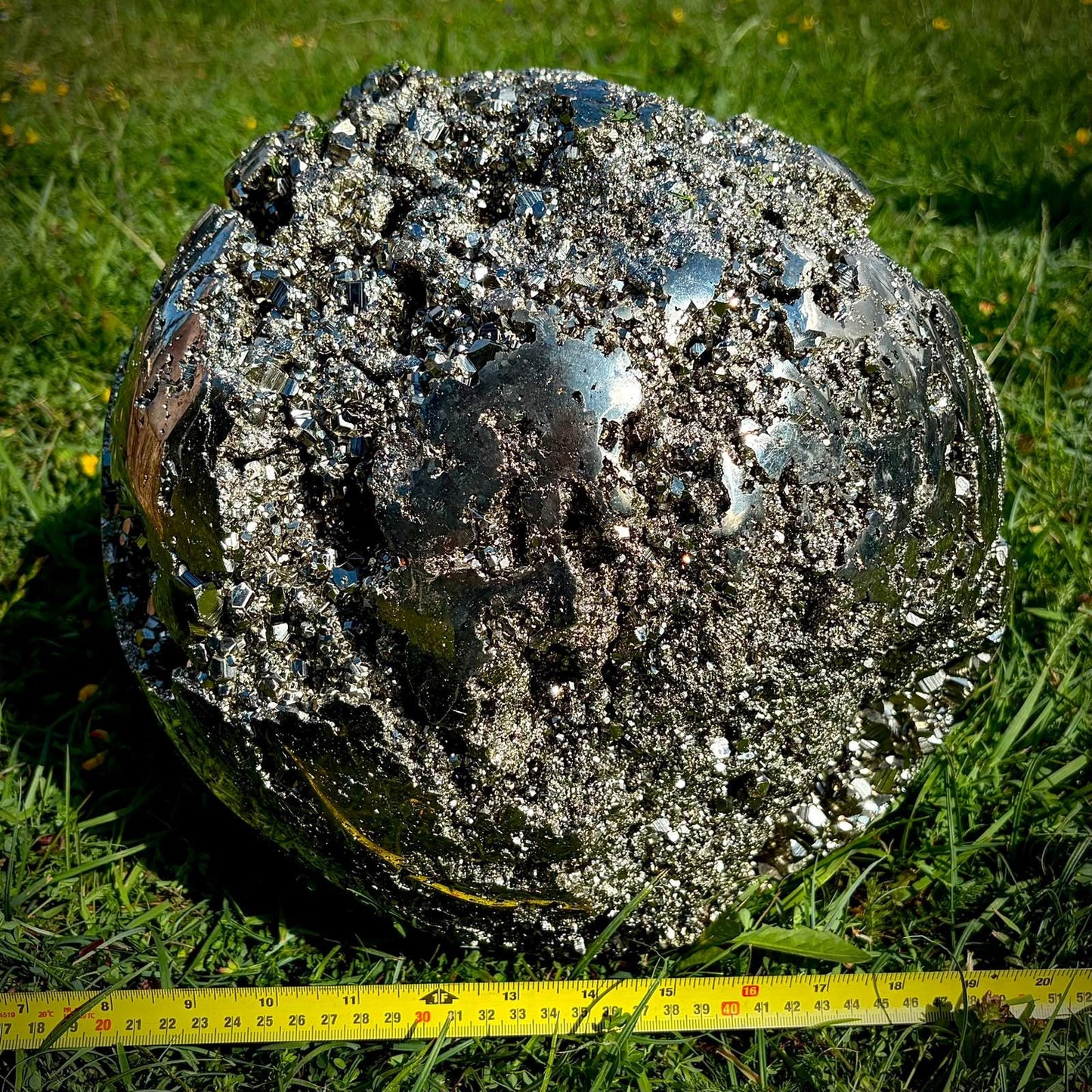 a high quality large crystal pyrite sphere for luxury interiors