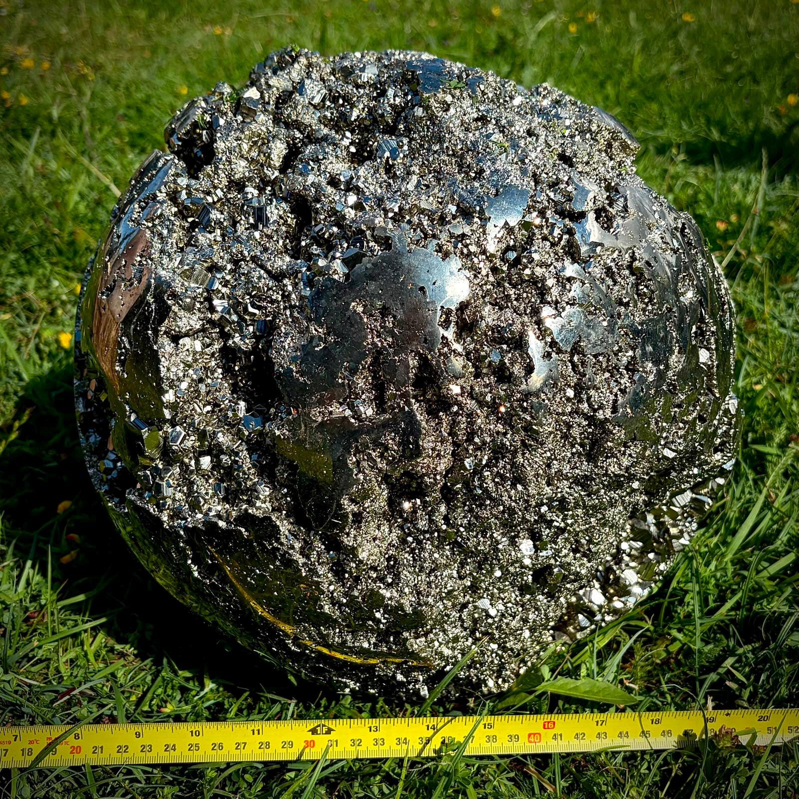 a high quality large crystal pyrite sphere for luxury interiors