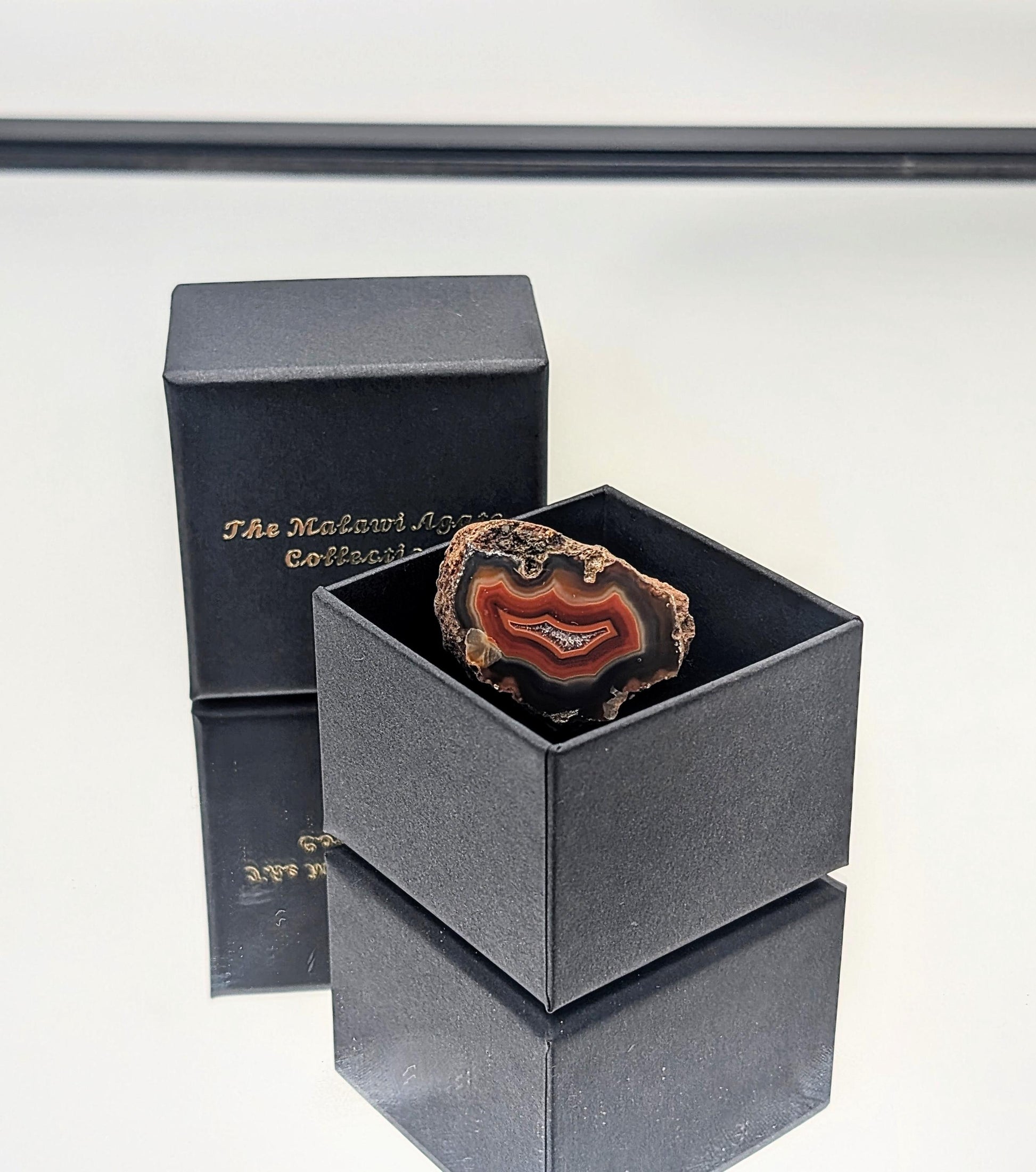A stunning Malawi Agate collection in a presentation box, ideal for gifting.