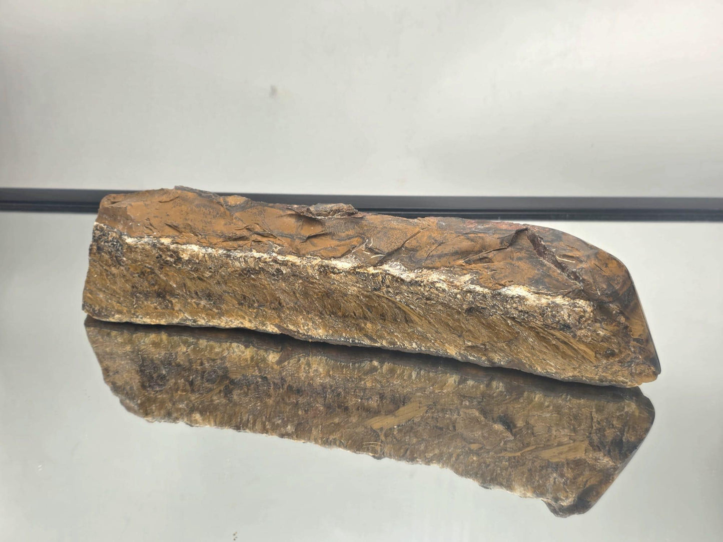 Close-up of Tiger’s Eye mineral with silky chatoyance