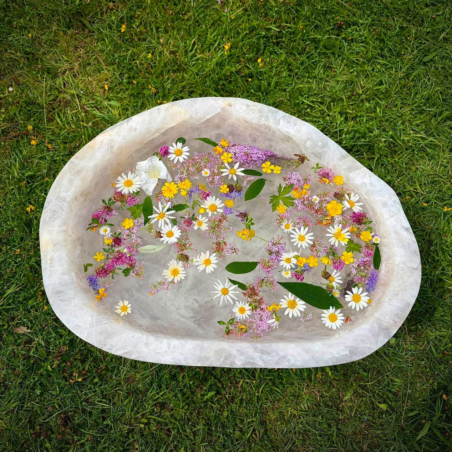 Hand-carved natural Quartz bowl with broad sculptural form f