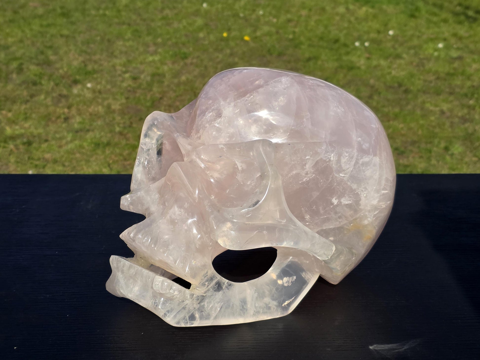 A handcrafted Rose Quartz Skull from Madagascar.