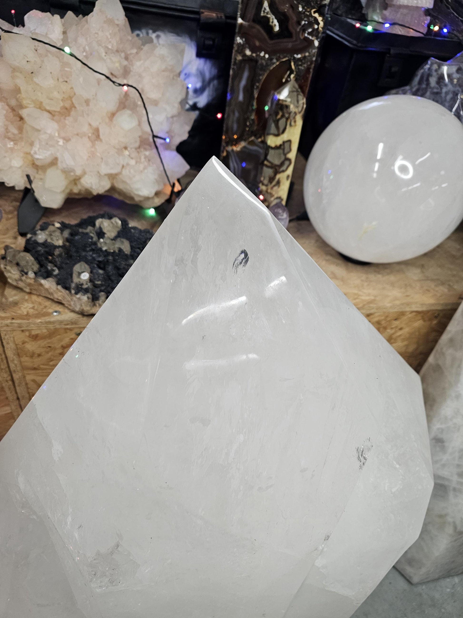 Giant quartz crystal point with natural clarity and polished surface – ethically sourced from Madagascar