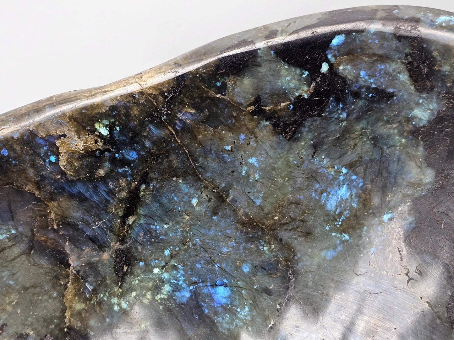 Polished Labradorite Crystal Bowl serving as an elegant centerpiece.
