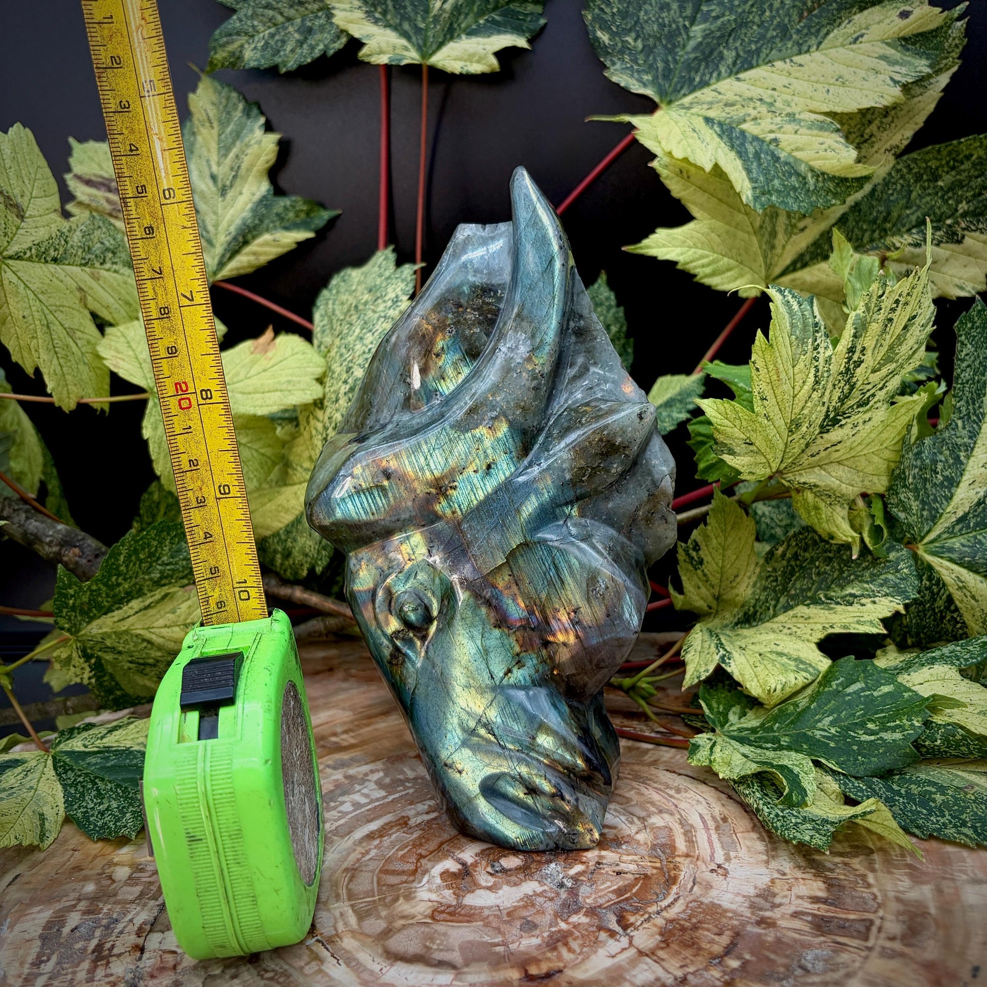Side view of hand carved Labradorite bull