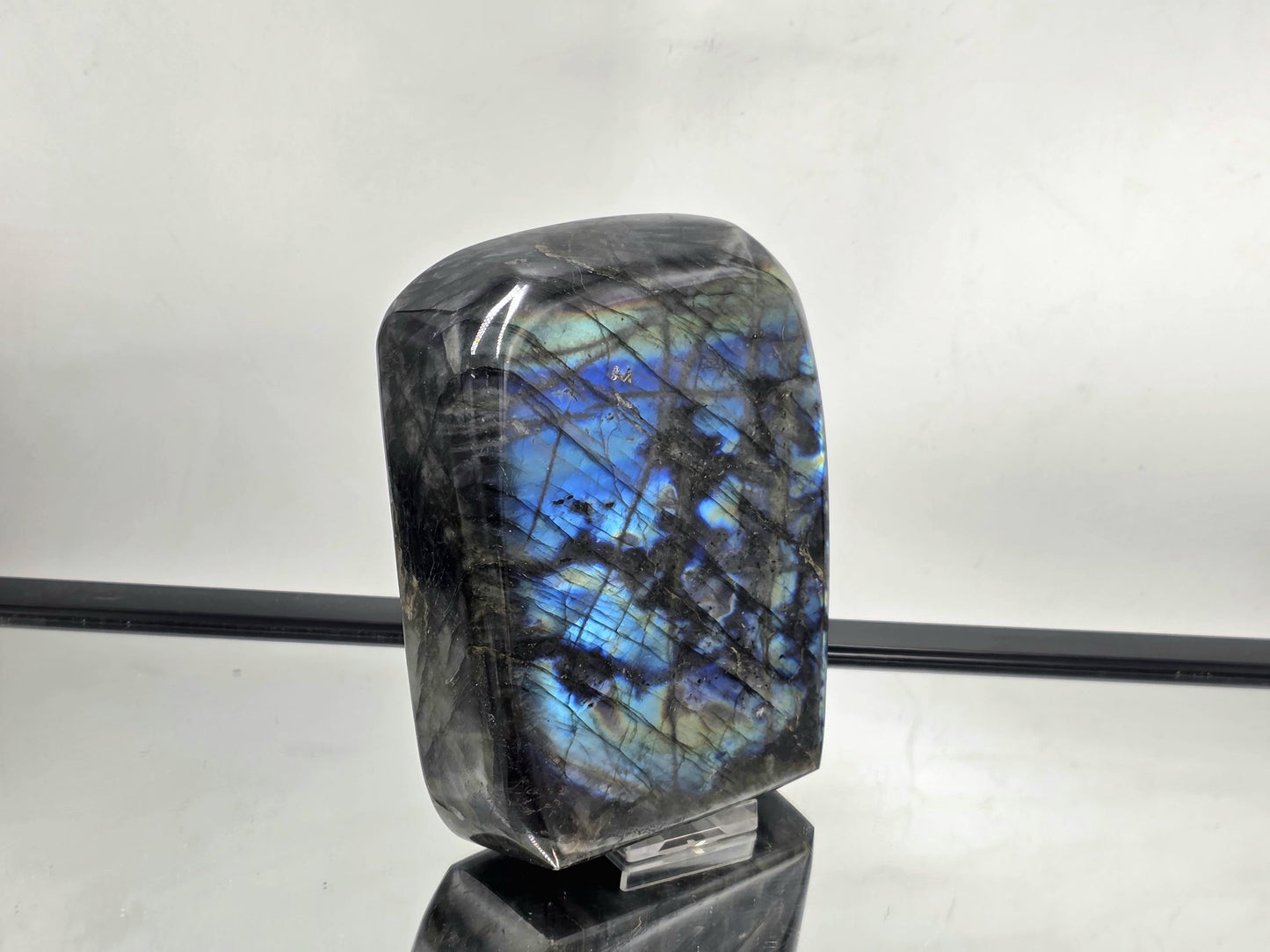 Large Labradorite Freeform showcasing bold flash and natural color variations, ideal as a decorative crystal piece.