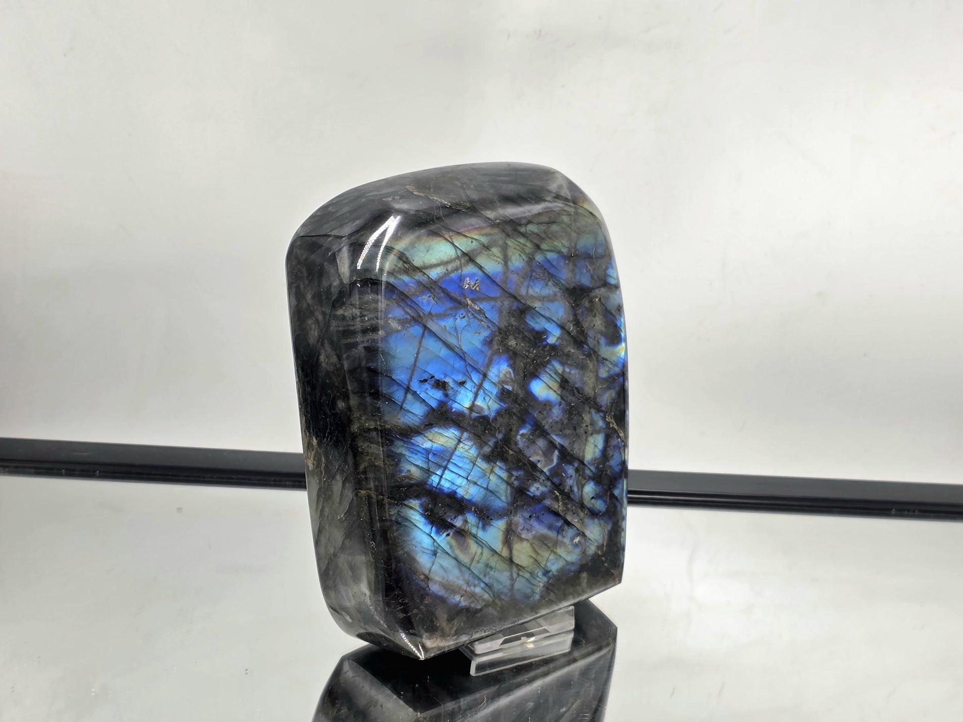 Large Labradorite Freeform showcasing bold flash and natural color variations, ideal as a decorative crystal piece.