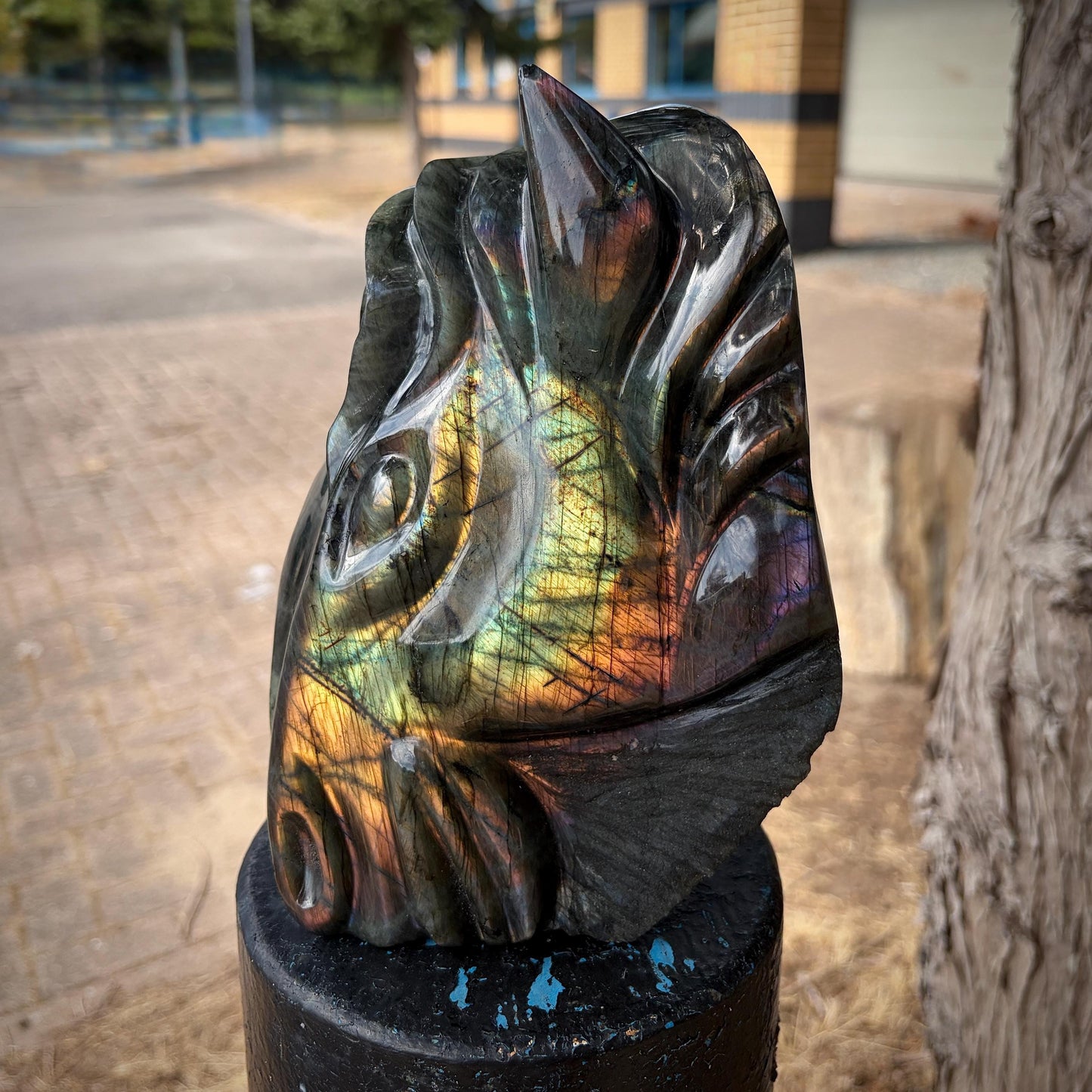 Labradorite horse sculpture showing natural labradorescent flash