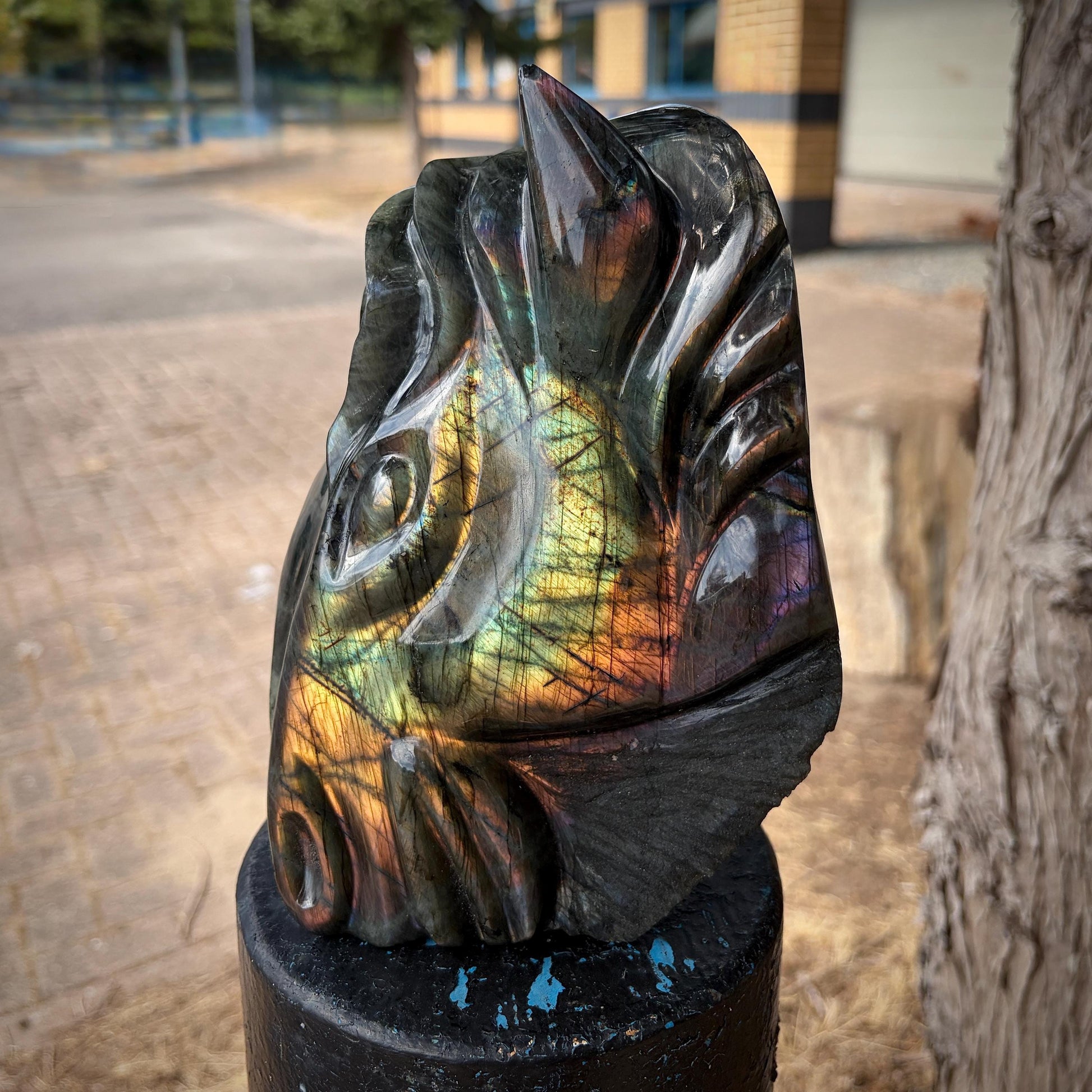 Labradorite horse sculpture showing natural labradorescent flash