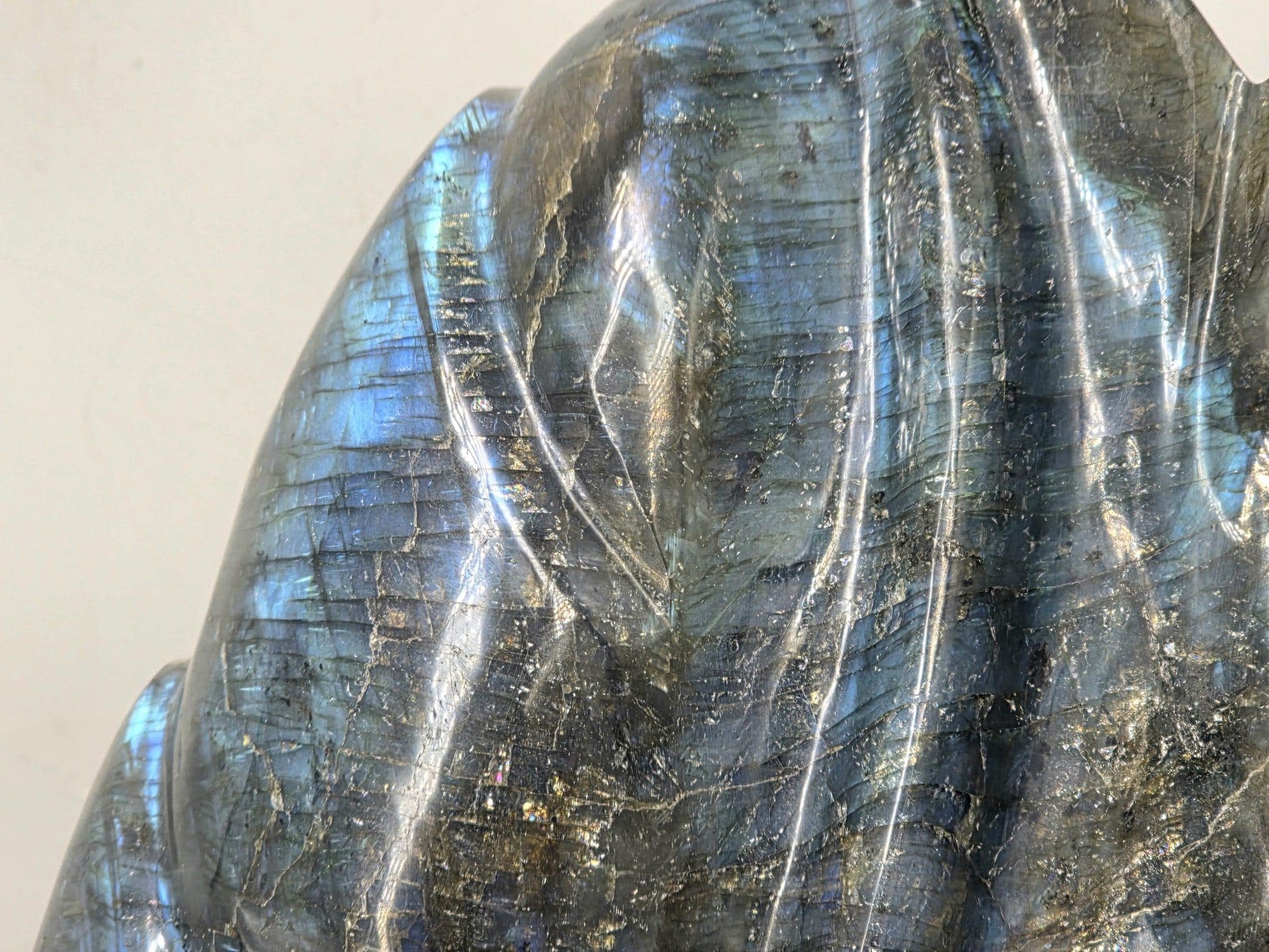Large Labradorite crystal leaf carving with iridescent flashes — a stunning statement décor piece and perfect Christmas gift for crystal lovers.