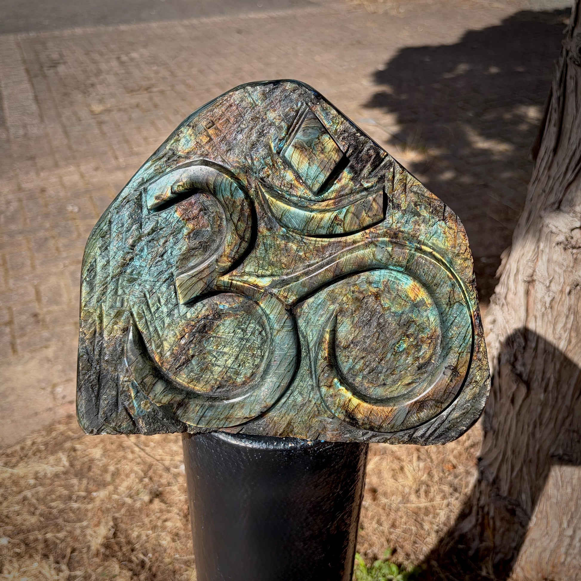 XL Labradorite Sacred Om freeform displaying vibrant blue, gold and purple flash across the polished surface.