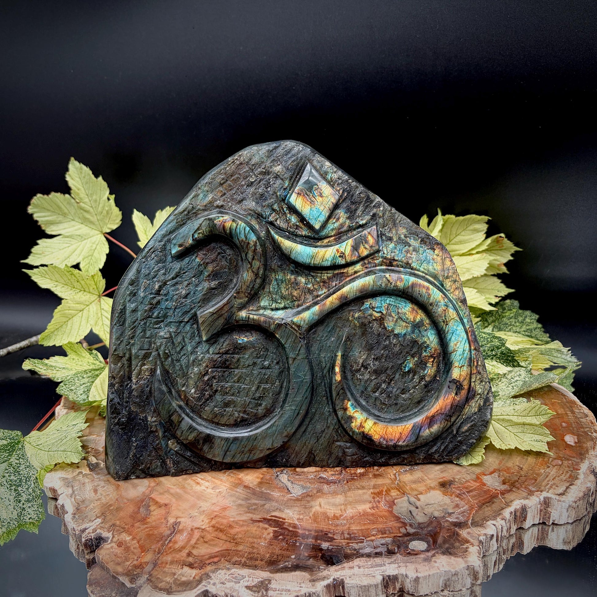 Front view of exceptional Madagascan Labradorite freeform featuring a hand-carved Sacred Om symbol.
