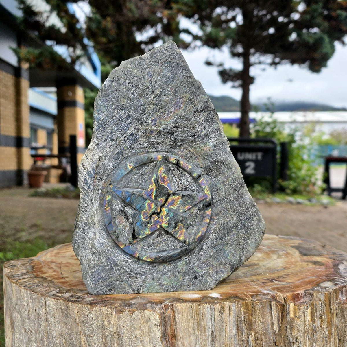 Natural Labradorite sculpture featuring a symbolic five-pointed star.