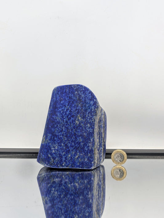 Collector-quality Lapis Lazuli crystal in freeform shape.
