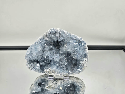 Large Celestite crystal cluster with breathtaking blue hues.