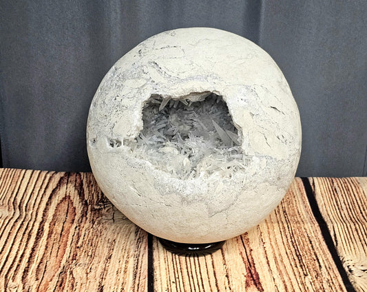 Very large Celestite Geode Sphere with fine needle crystals, showcasing stunning natural beauty.